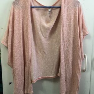 A pink and a gray cover up